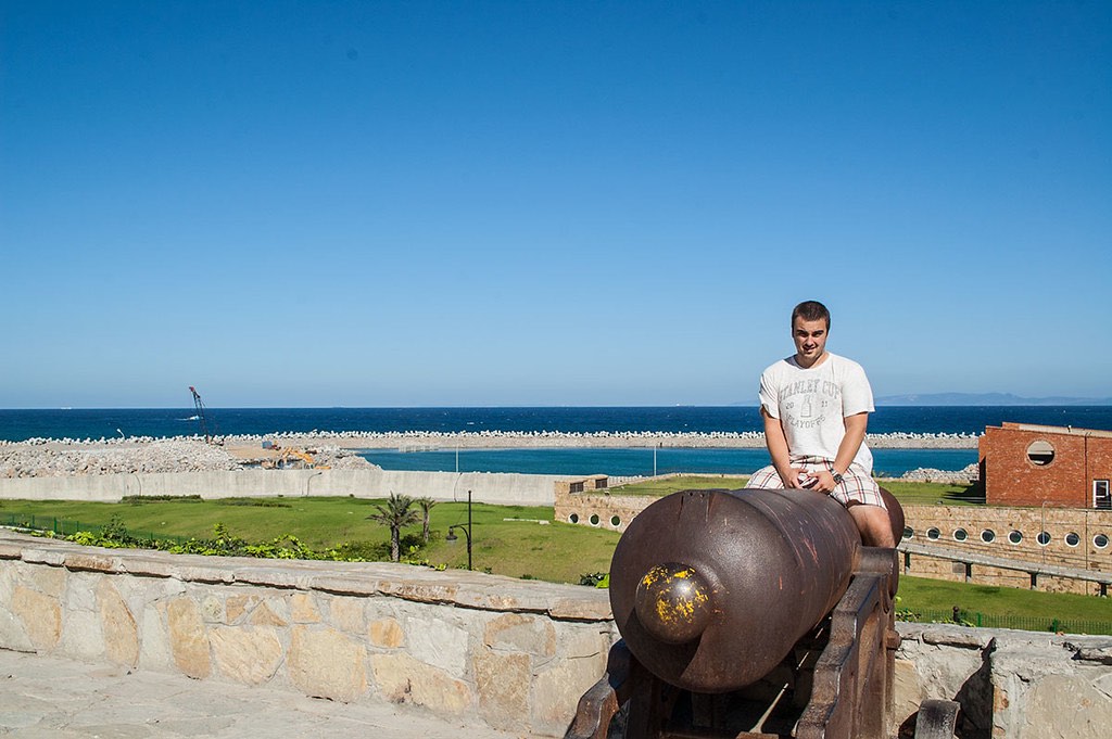 Sitting on an old Spanish cannon in Tangier